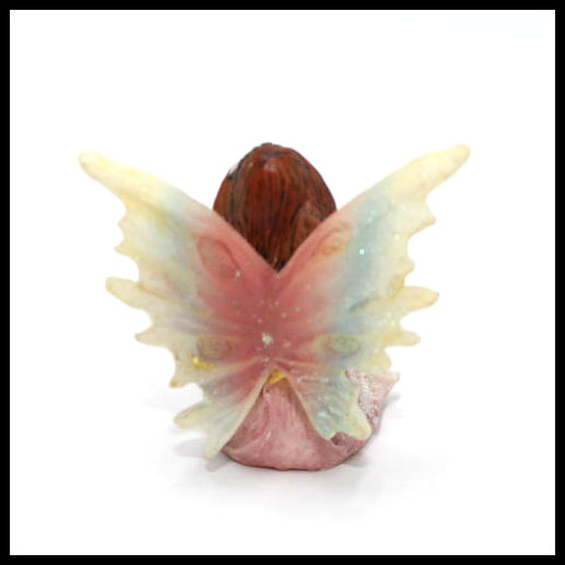 Fairy Sitting With Rainbow Wings