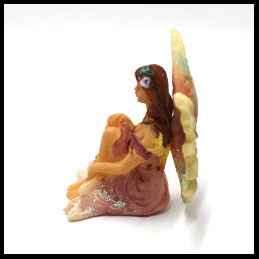 Fairy Sitting With Rainbow Wings